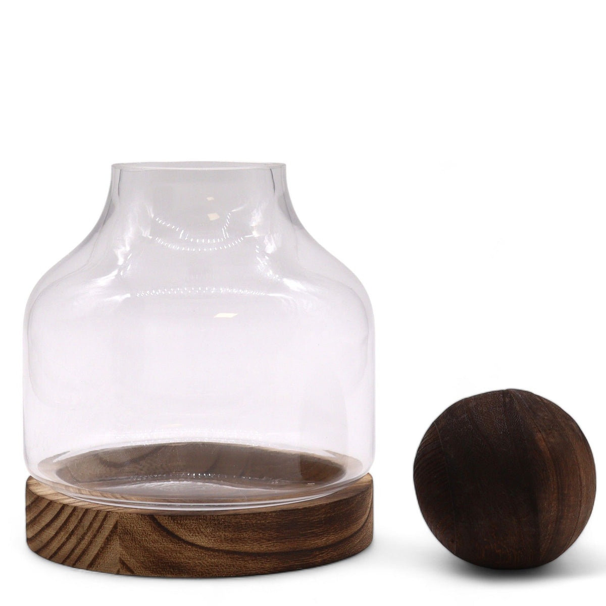 Glass terrarium with ball top and dark wood base